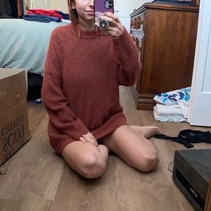 Orange/red American eagle sweater.